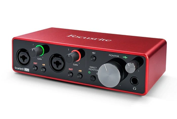 Red sided audio interface with black front panel, placed against a white background